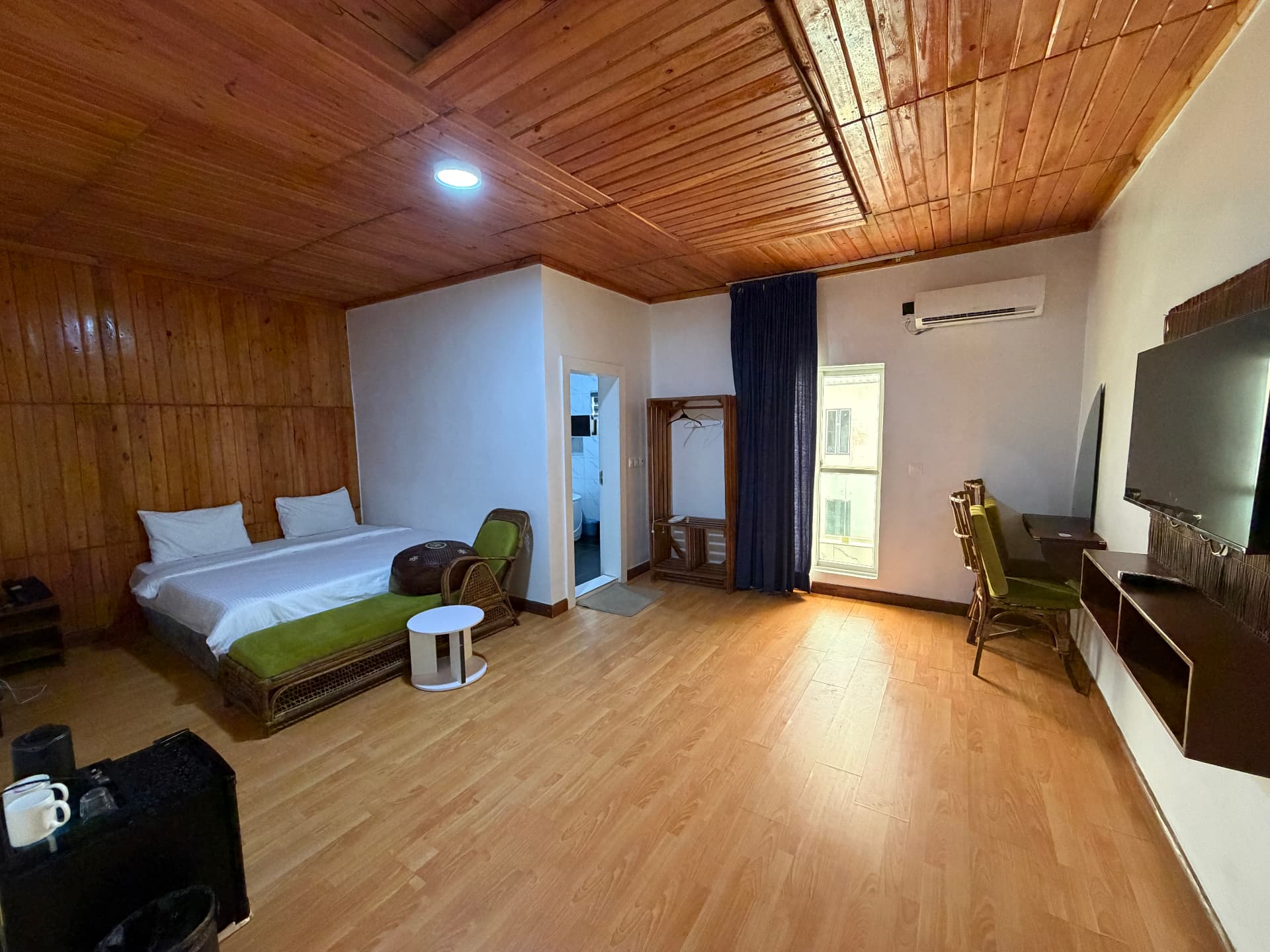 The room in cedar, bed to bathroom - Honeymoon Room at Timeless Haven & Cottage, photo 1 of 2